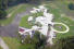 John Travolta's home in Ocala, FL, with private Boeing 707 and Gulfstream II, alongside his 7,500 foot runway. I wonder what his Hollywierd buds think of his destroying all that ozone with his aeroplanes?