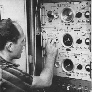 NBS scientist is shown retarding by 0.1 second on April 1, 1964 the clock which maintains Universal Time - RF Cafe