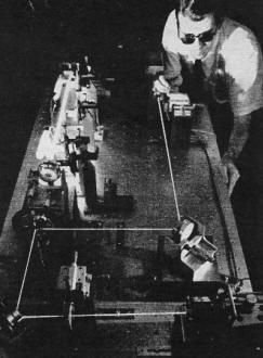 helium-neon gas laser beam for experimental optical communications setup at Bell Labs - RF Cafe