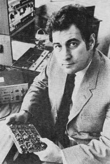 Ray M. Dolby, holding one version of his stereo noise reduction system - RF Cafe