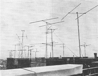 Forest of antennas on apartment roof - RF Cafe
