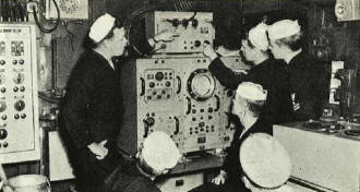 Enlisted men in a radar unit listen to instruction - RF Cafe