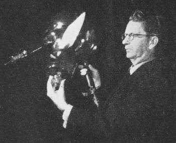 John Logie Baird, holding his latest invention, the Telechrome - RF Cafe