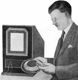 Arthur H. Watson holding the new scanning disc - RF Cafe