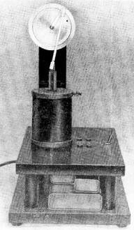 Constructed on a black lacquer wooden base, the resonant-coil engine is an impressive-looking unit - RF Cafe