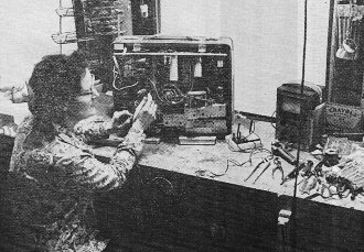 At her woman-sized bench, Kathi Kramer shoots a toughie - RF Cafe